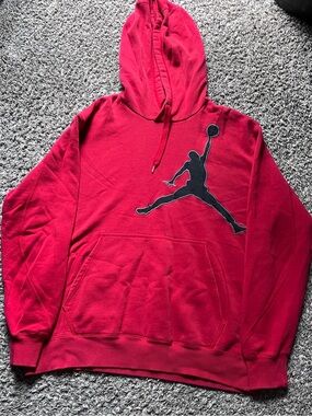 Red JORDAN Men's Pullover Hoodie with Jumping Basketball Logo